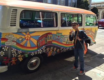 Student in front of bus