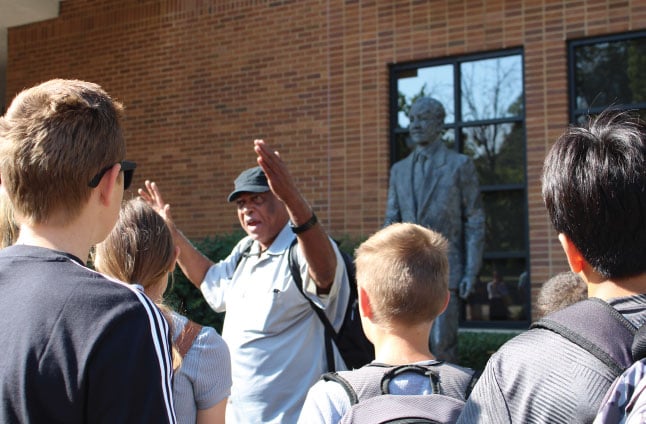 Tour Director with group outside Birmingham Civil Rights Institute